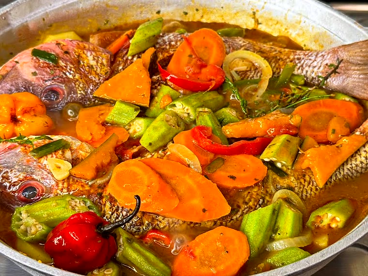 Whole steamed fish with peppers and lime