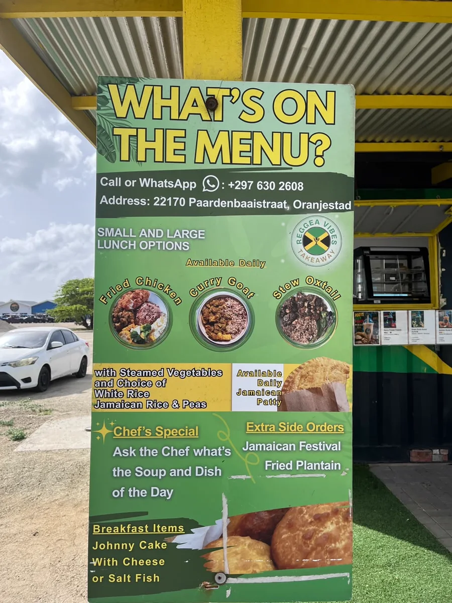The What&rsquo;s On The Menu board at the Reggae Vibes stand on Paardenbaaistraat